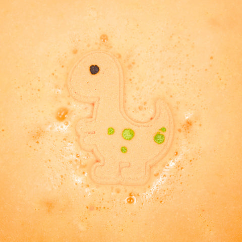 Bombe de bain Dino artisanale couleur orange, verte et mauve fait main Québec